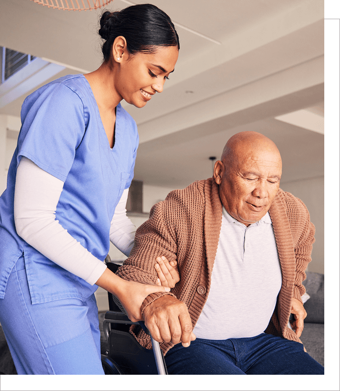 a1 (1) A nurse helping an elderly man to stand up.