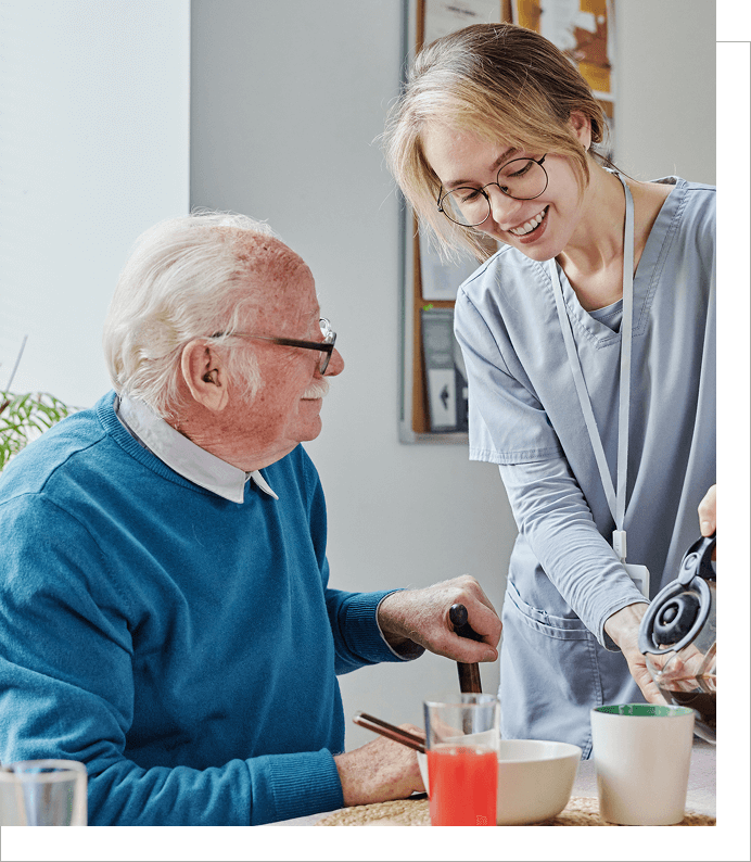 s1 (1) A woman helping an old man with his glasses